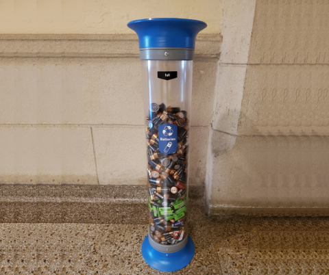 Battery recycling bin full of batteries
